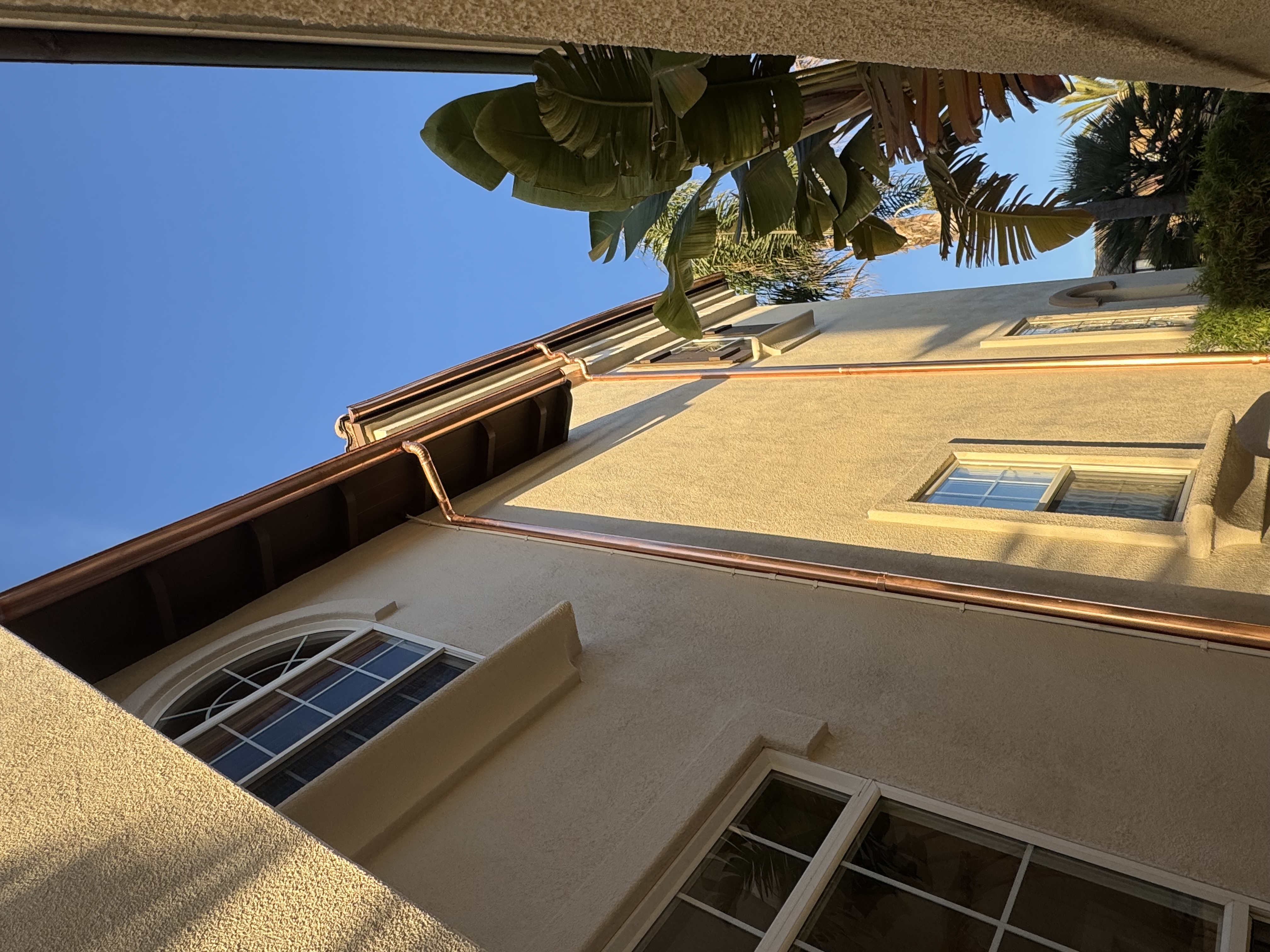 New copper gutter and downspout installed