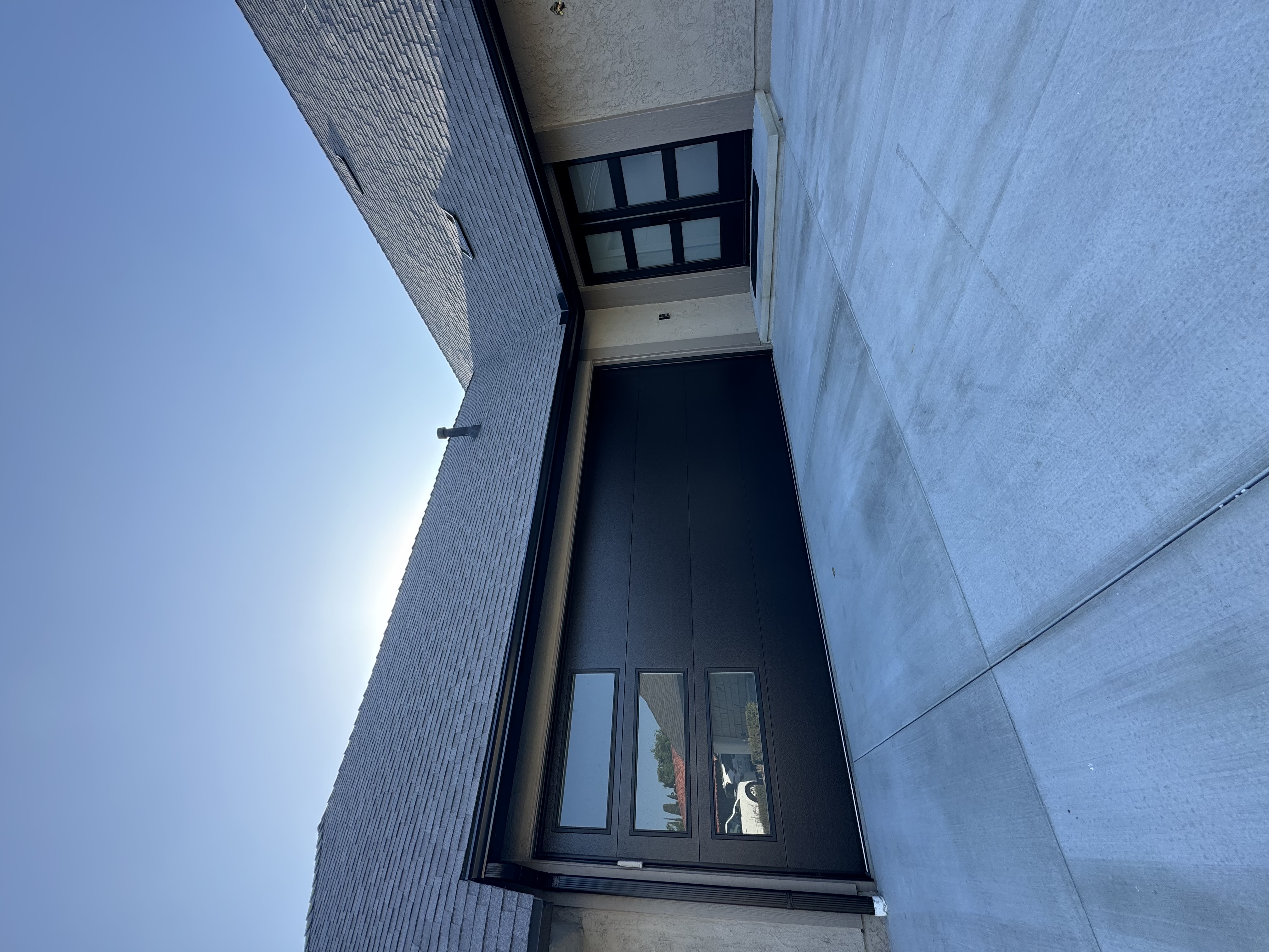 Black fascia gutter system on modern home in Orange County