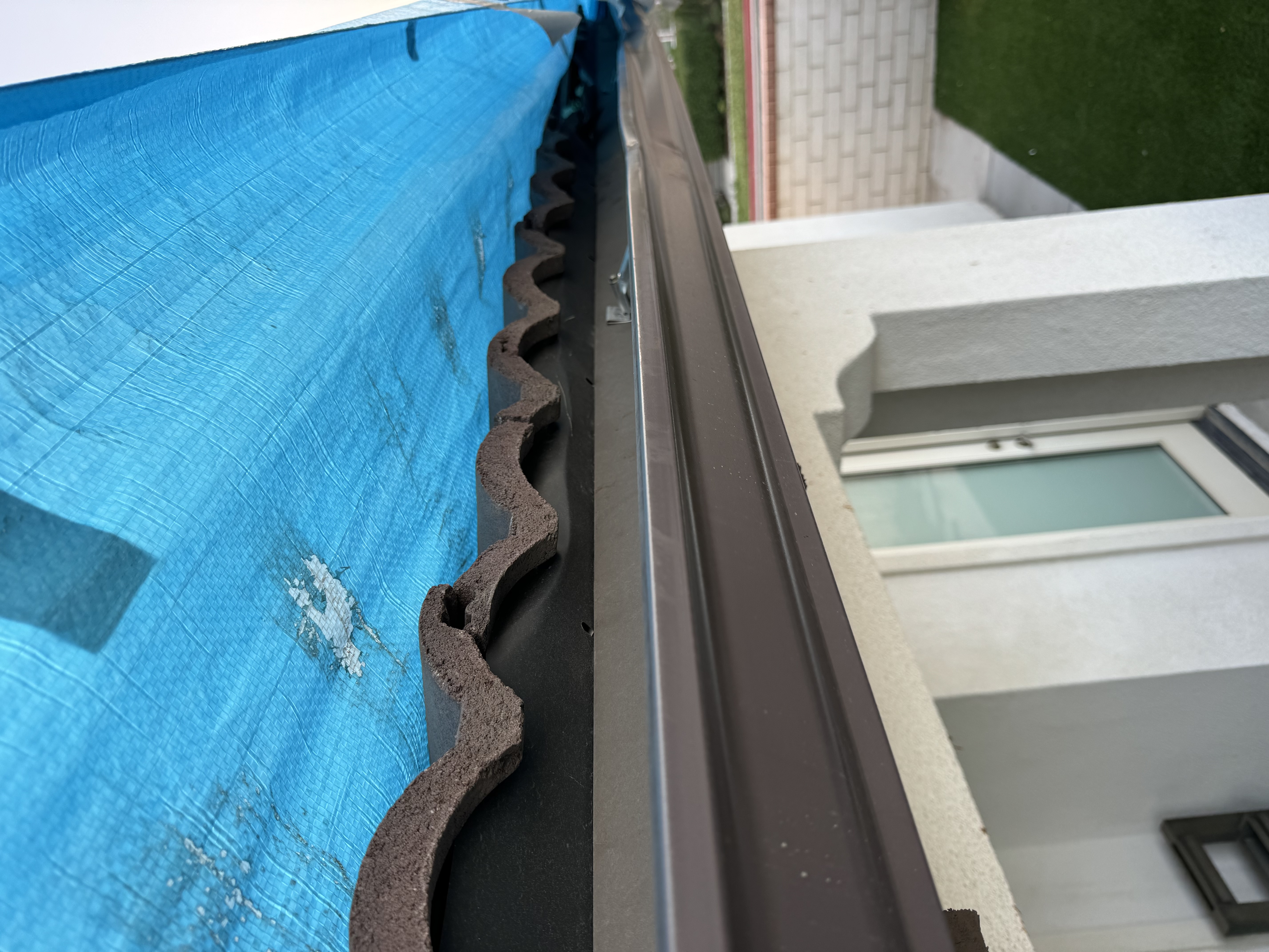 Eave and gutter line during roofing project