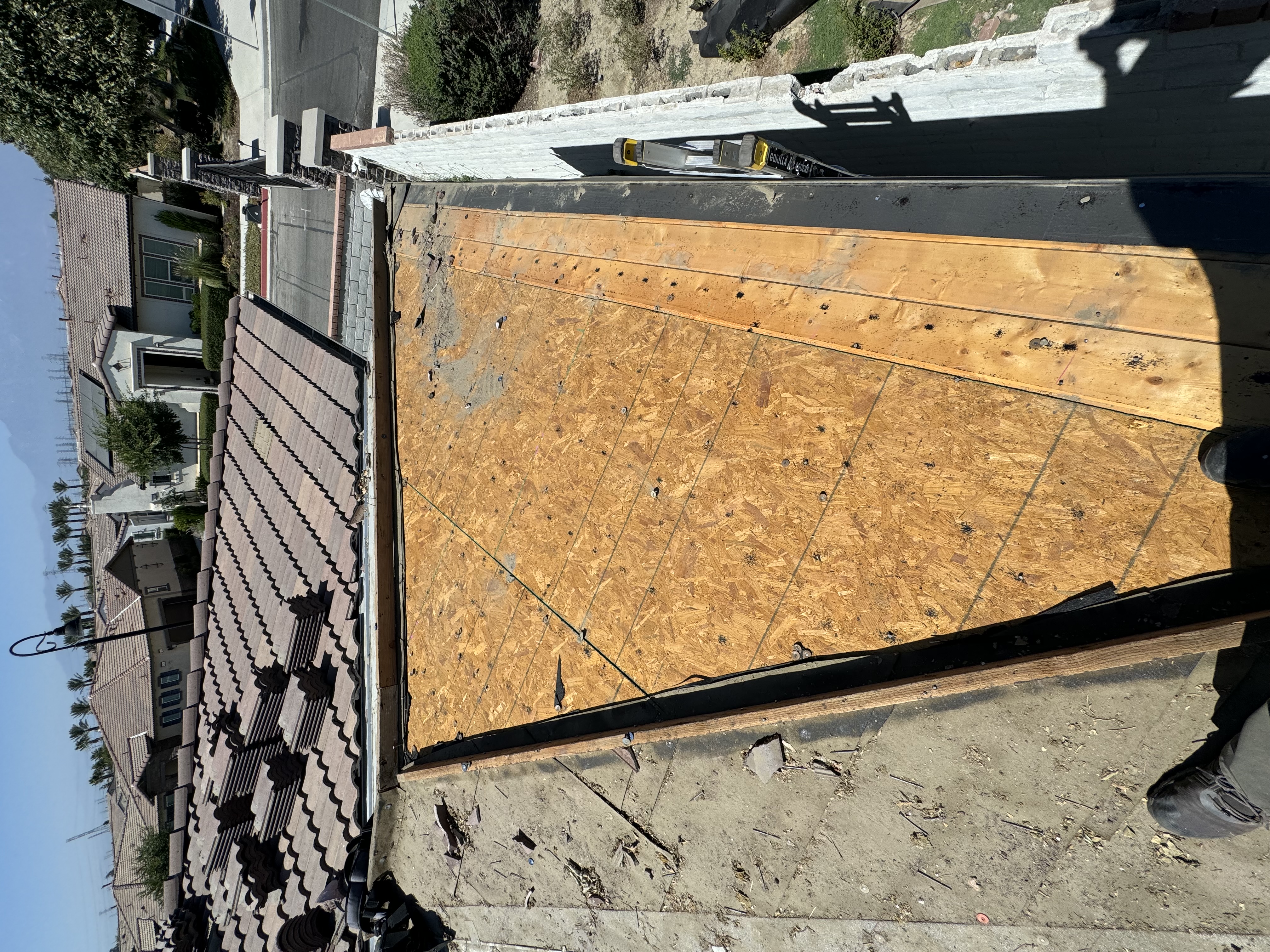 New OSB decking installed during roof replacement