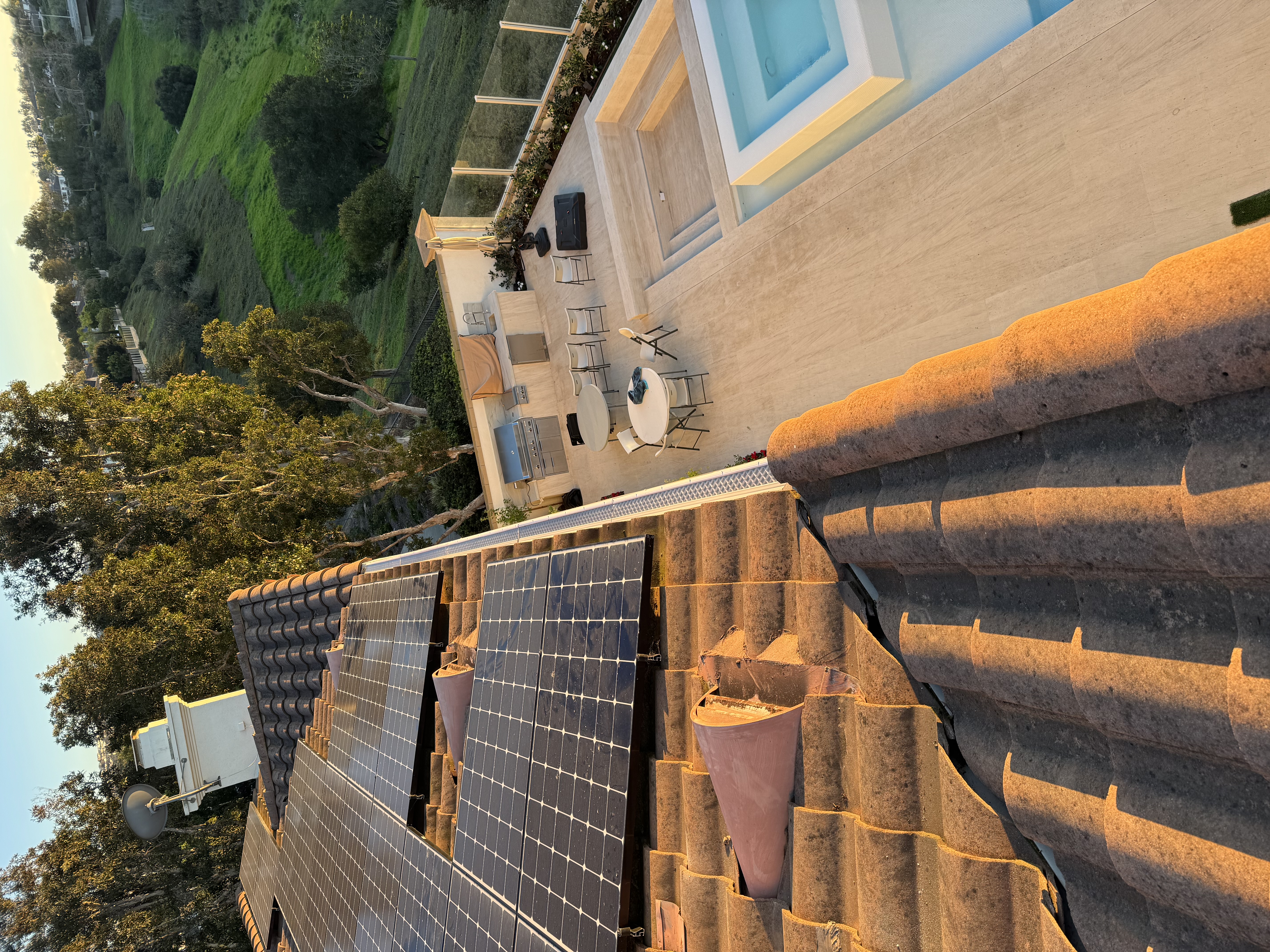 Cracked concrete tile damage near solar panels before repair