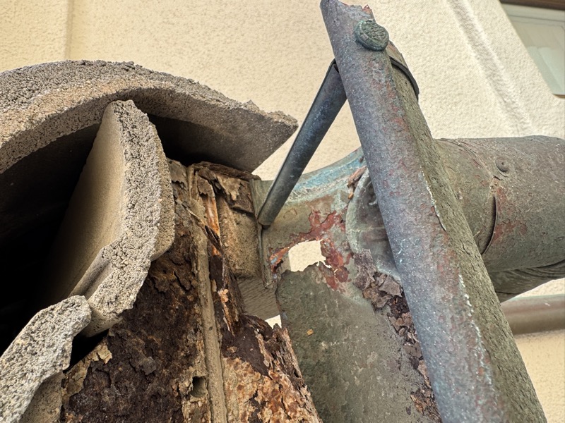 Rusted corroded gutter with holes